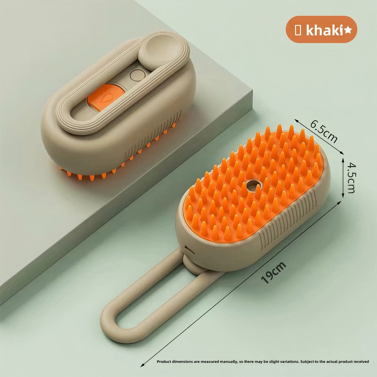 Khaki option: pet spray brush with orange bristles and loop handle, shown with its back and its 19 cm size