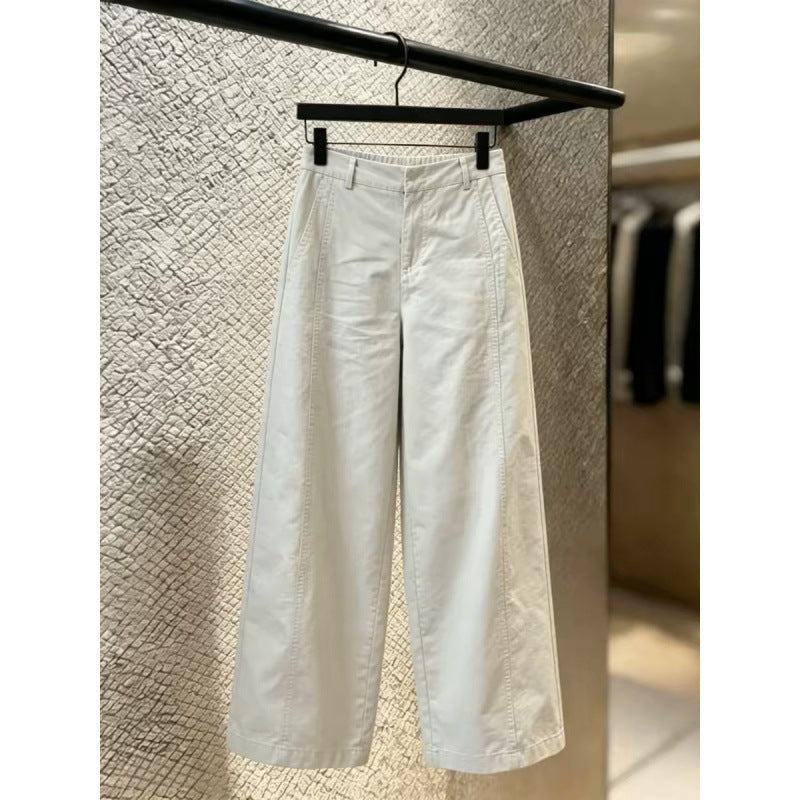 Off white wide leg trousers front view with belt loops and button zip fly