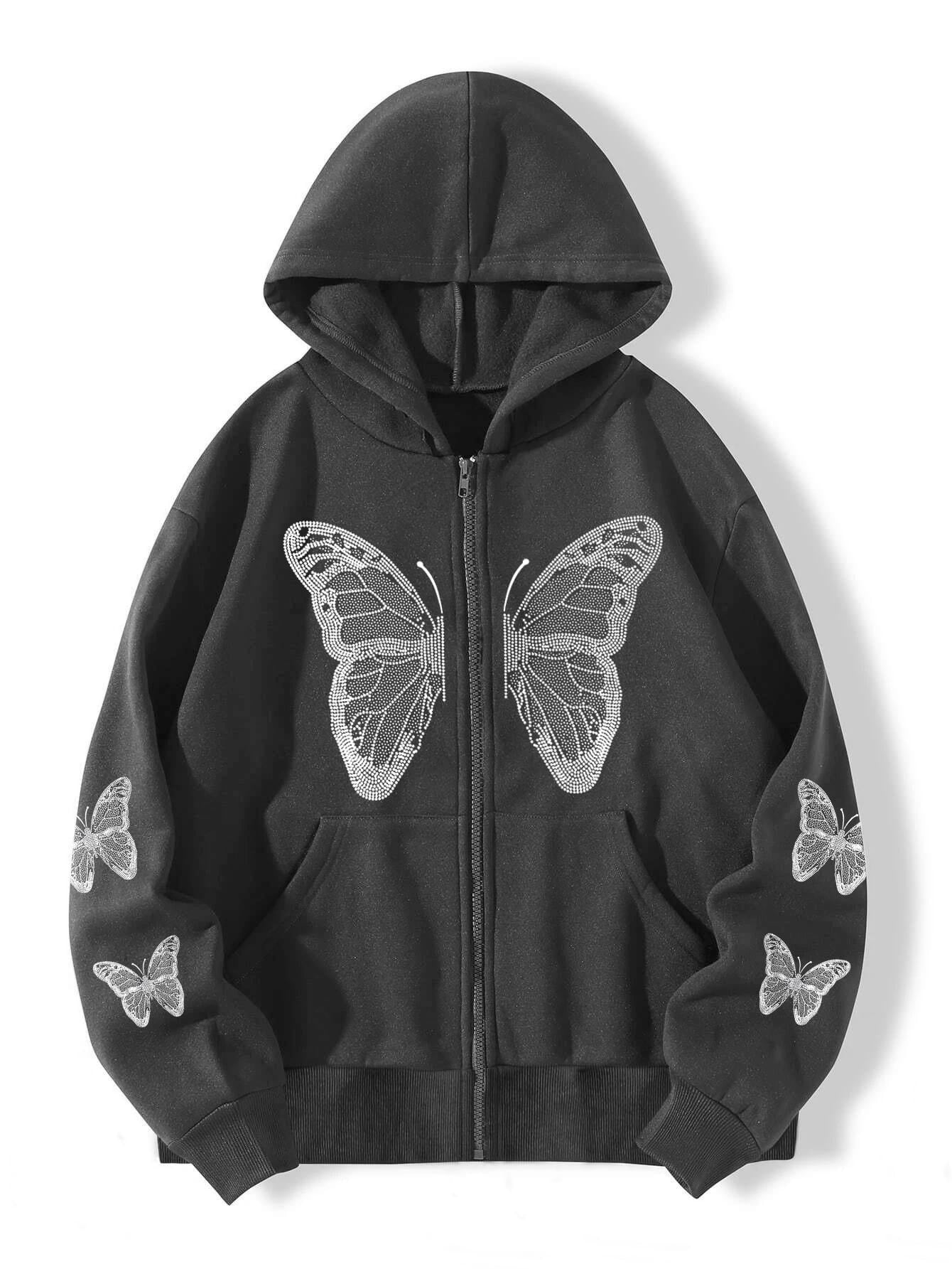 Close detail of the rhinestone butterfly wing and the front zip on the hoodie
