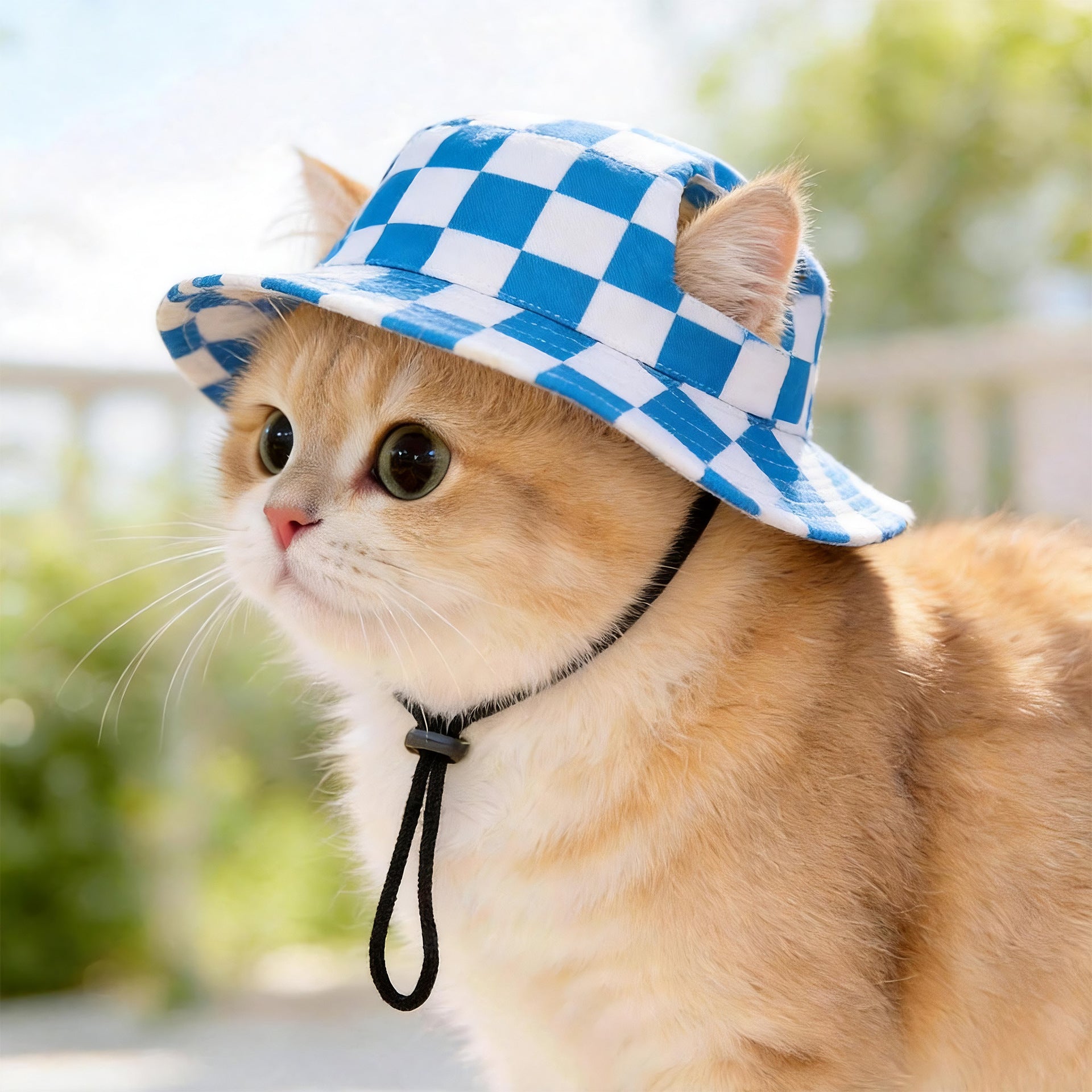 Pet bucket sun hat with ear holes and chin cord in an orange dinosaur print, view 18