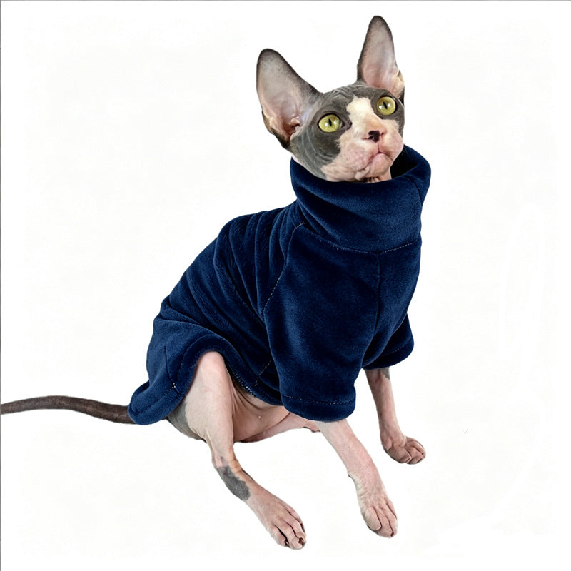 Haze blue mink velvet cat sweater on a Sphynx cat in a cozy indoor scene