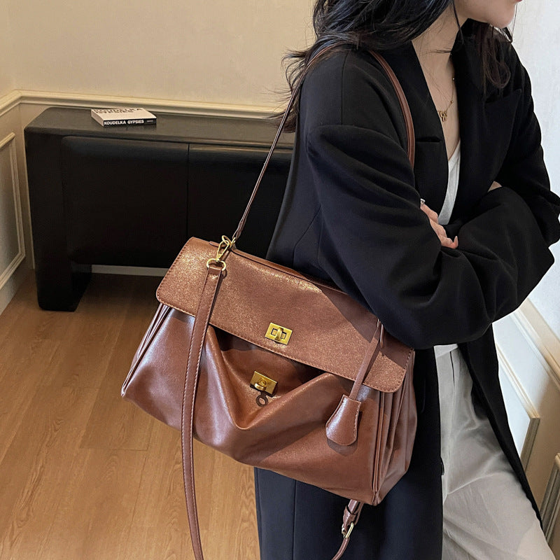 Interior of tote showing zippered pocket and phone slot