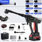 Cordless high pressure gun watering garden plants with a soft spray