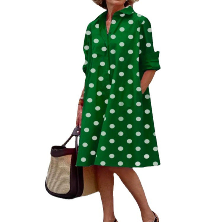 Green and White Polka Dot polyester shirt collar long sleeve A-line midi dress on a standing model
