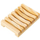 Natural pine wood slatted soap rack with pale grain and side rails on a white background