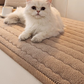Quilted lambswool sofa cover with a wave stitch face on a sofa