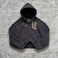 Black washed zip-up hooded sweatshirt with an embroidered animal on the chest and a wolf face inside the hood