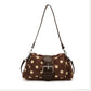 Coffee brown polka dot shoulder bag with cream dots and dark brown buckle band, shown for the Coffee option