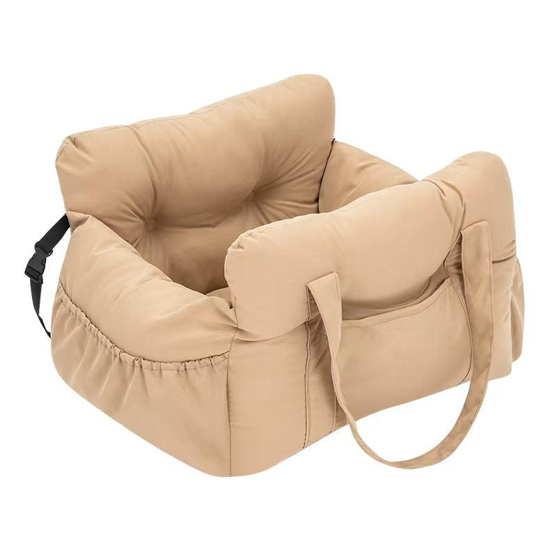 Padded car seat pet bed with raised bolster walls, carry handles and an inner clip detail of the padded bolster wall
