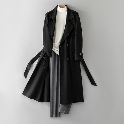 Black double breasted double faced wool overcoat with belt shown on a hanger