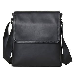 Slim men's flap shoulder bag with a smooth matte finish carried over the shoulder