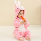 Baby in a pink rabbit flannel romper with long ears and a white belly panel, size 110