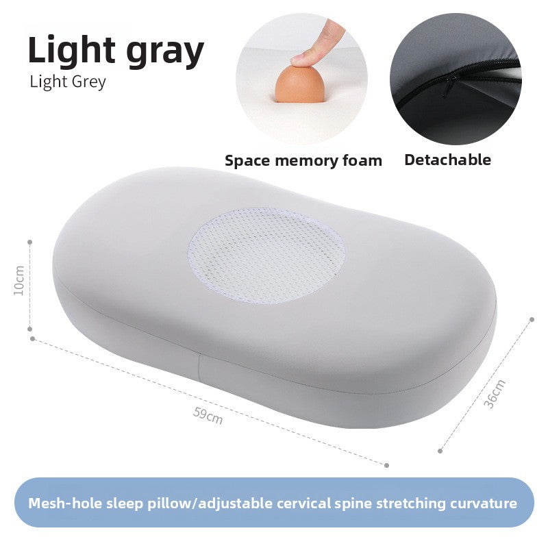 Light gray oval memory foam pillow with breathable mesh center panel and dimensions