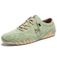 Light green microfiber low-top lace-up casual shoe with a wavy cream lug sole, three quarter view, size option 41