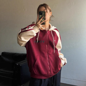 Color block zip hoodie shown from the back on model