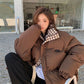 Nylon shell padded puffer coat with elasticated cuffs and zip front, coffee brown colourway