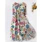 Loose polyester floral midi dress with a rounded doll collar and half button placket
