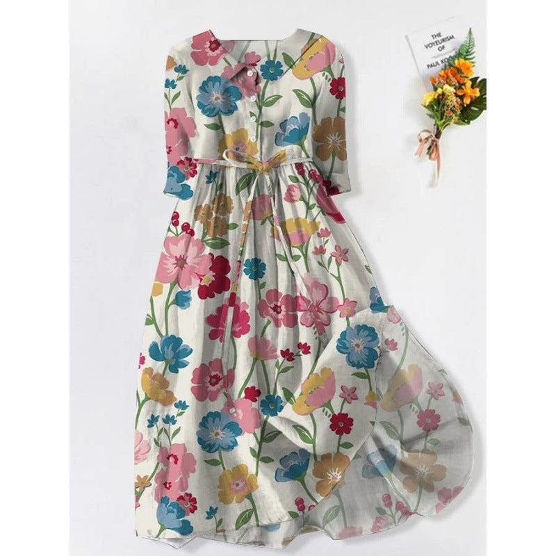 Loose polyester floral midi dress with a rounded doll collar and half button placket