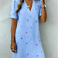 Printed dress side profile showing the drape and defined waistline