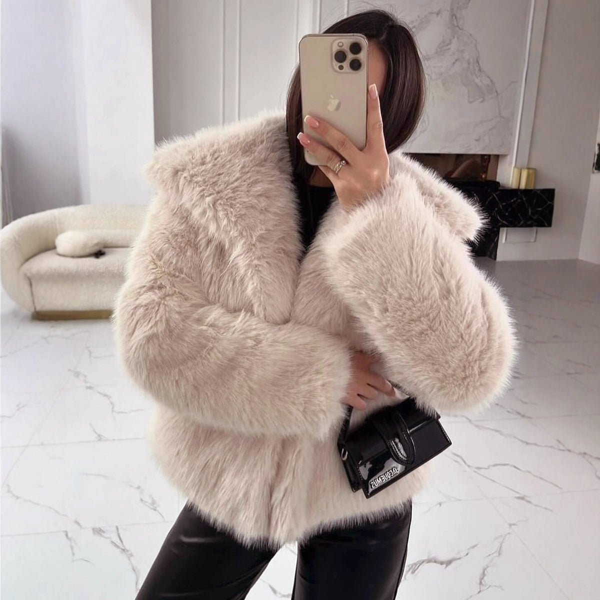 Blush beige vegan fur jacket on a model taking a mirror selfie, option Blush Beige, size M