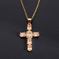 Silver tone cross pendant paved with clear cubic zirconia, close up detail