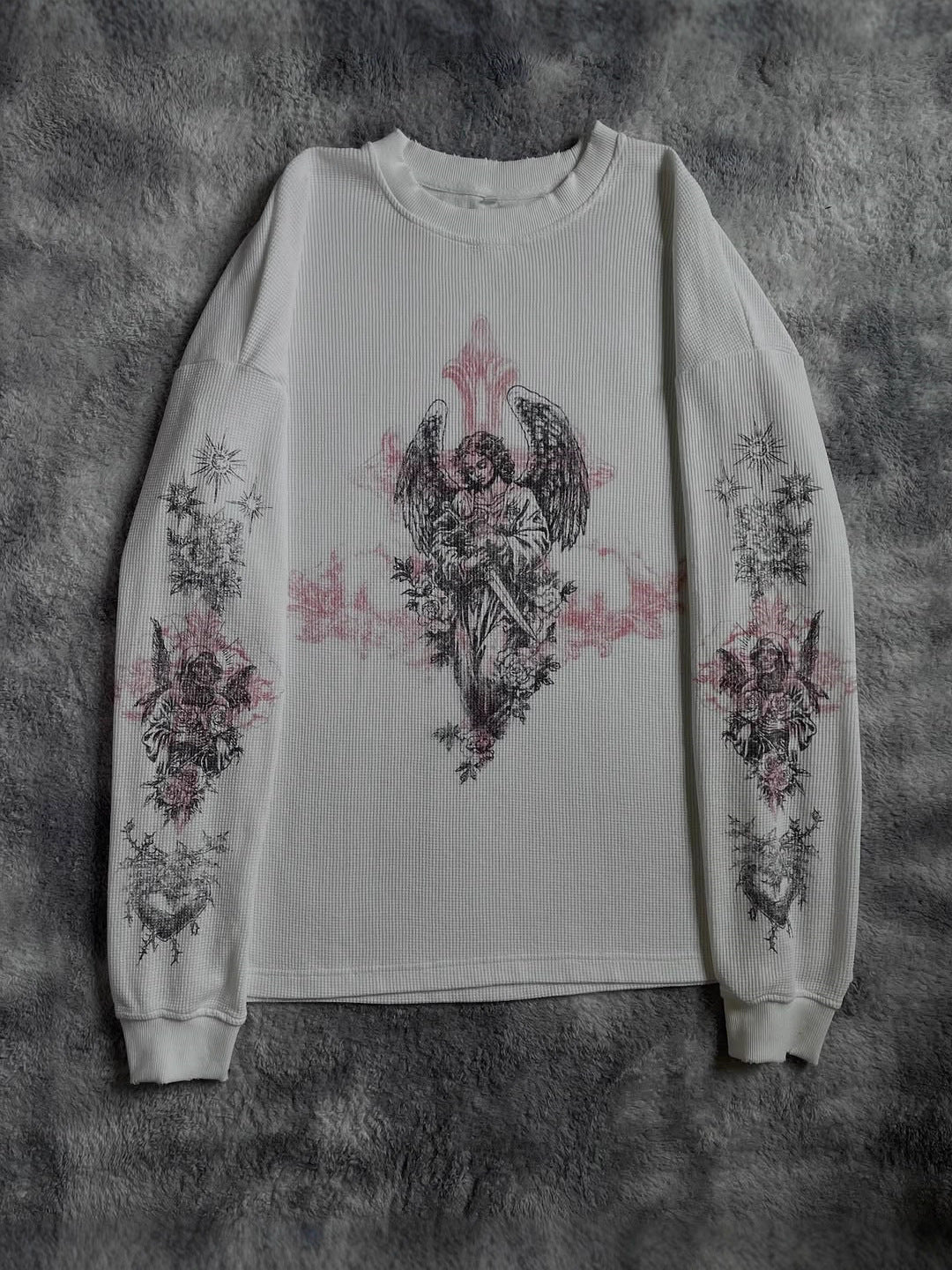White polyester fleece zip hoodie showing the gothic bandage and thin serif slogan print