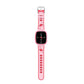 Pink children's smart watch with an analog clock face on a pink strap with a metal buckle, front view