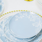 Stacked plum blossom porcelain plates in blue and white