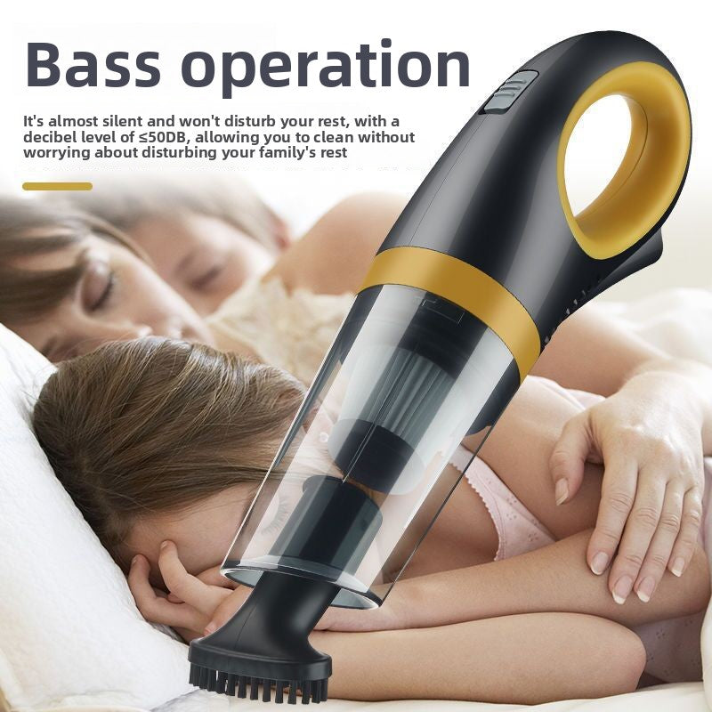 Black and yellow handheld car vacuum with a low noise around 50 decibels label