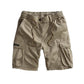 Men's loose cargo shorts shown flat, mid length around the knee with multiple pockets
