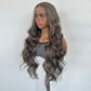 Three quarter view of a long wavy gray brown 13x4 lace front wig on a mannequin