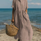 Short-sleeve cotton linen dress hemline shown in detail