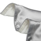 Silk pillowcase with a contrast piped border shown on a smooth white bed