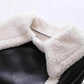 Cropped vegan leather sherpa aviator jacket worn open over a white top, short hem at the waist
