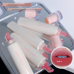 Several cream lip glaze tubes on a mirror tray beside a close up of glossy rose tinted lips