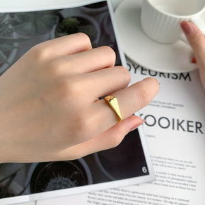 Heart titanium steel ring side profile showing band thickness and heart shape
