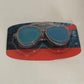 Polycarbonate mirror lens swim goggles in an aviator shape on a plain backdrop