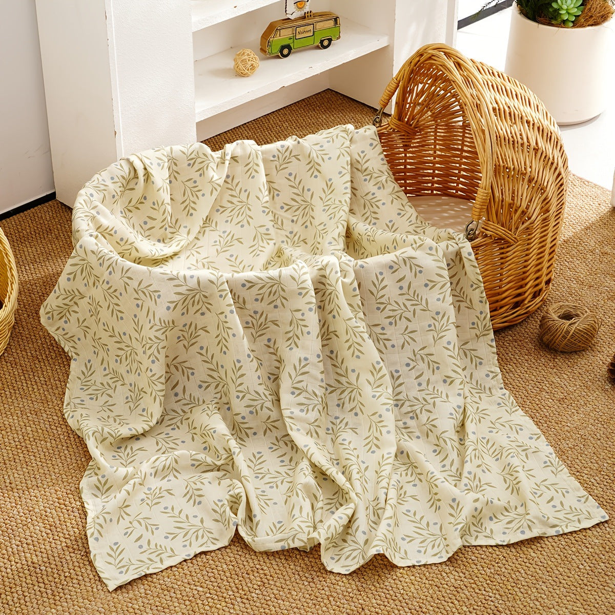 Cotton muslin gauze baby blanket in a printed design, light and breathable double layer fabric