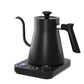 Matte black gooseneck electric kettle standing on its square control base on a white background