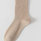 Khaki bamboo viscose blend mid calf sock laid flat on a pale background