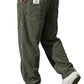 Corduroy trousers worn with a plain tee to show the relaxed straight leg cut