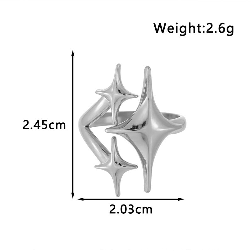 Silver star ring with maker chart marking 2.45 by 2.03 cm and 2.6 grams