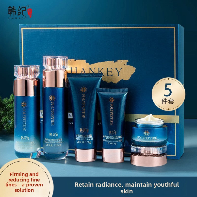 Hankey Polypeptide five piece set with two bottles, a cleanser tube, a BB cream tube and a cream jar beside a blue gift box