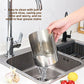 Hand rinsing the stainless steel kitchen holder under a running tap over a stainless steel sink