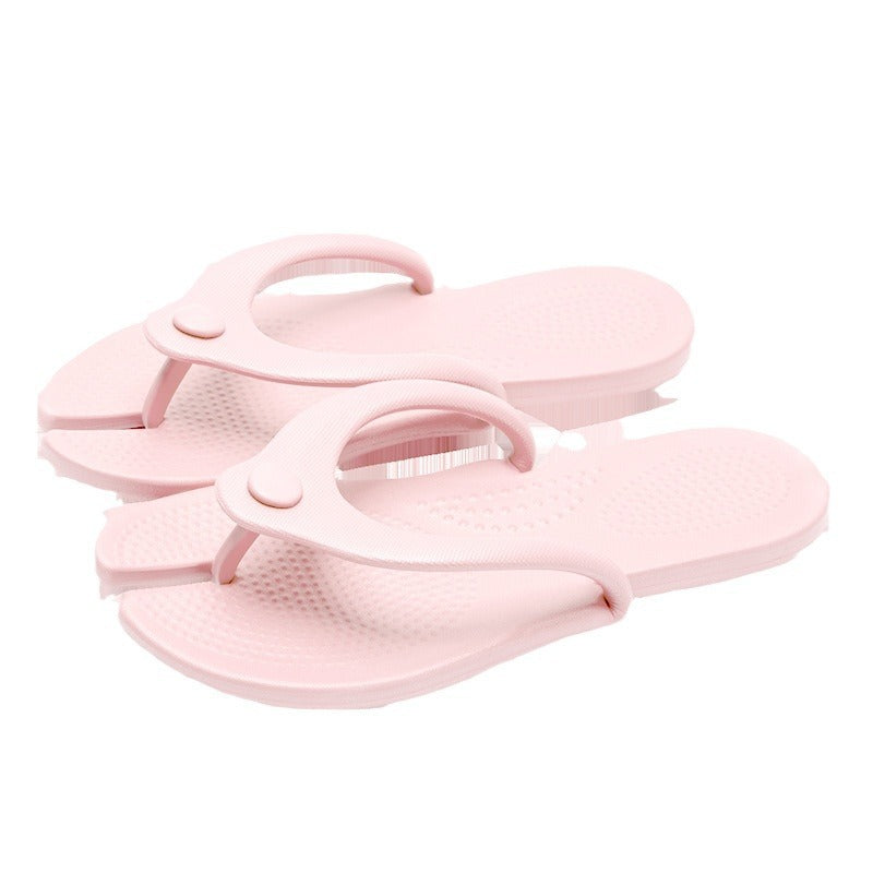 Pink one piece EVA thong travel slippers shown as a pair on a plain white background