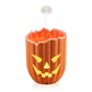Orange pumpkin humidifier diffuser shown lit with mist rising from the top cone