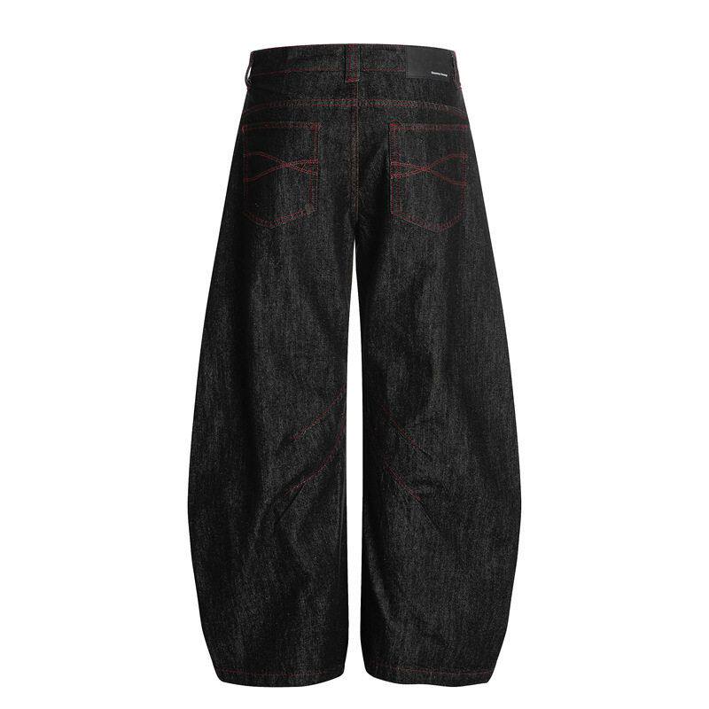 Back view of wide leg jeans with patch pockets and red seam detail
