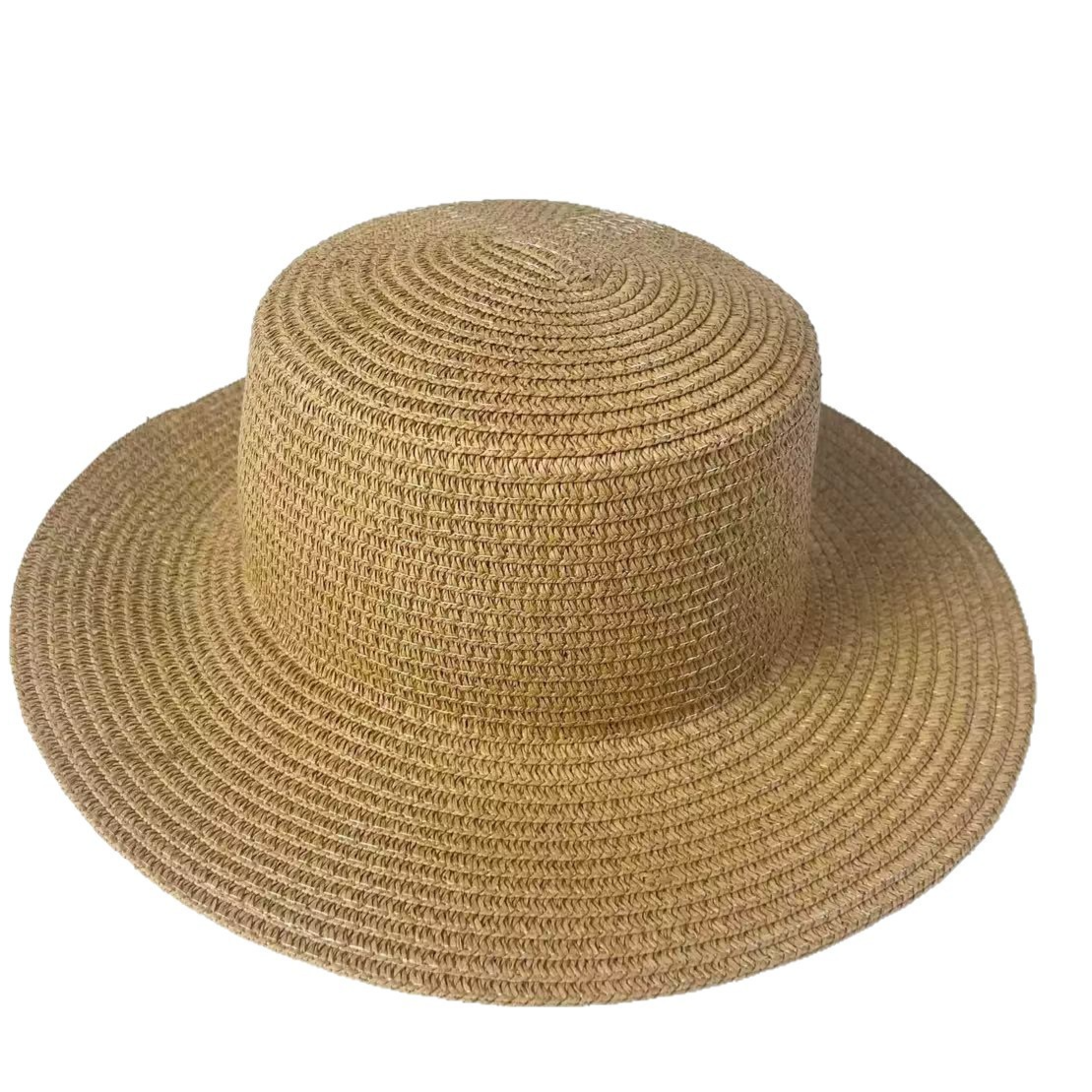 Close view of the open paper straw weave on a wide brim flat top sun hat