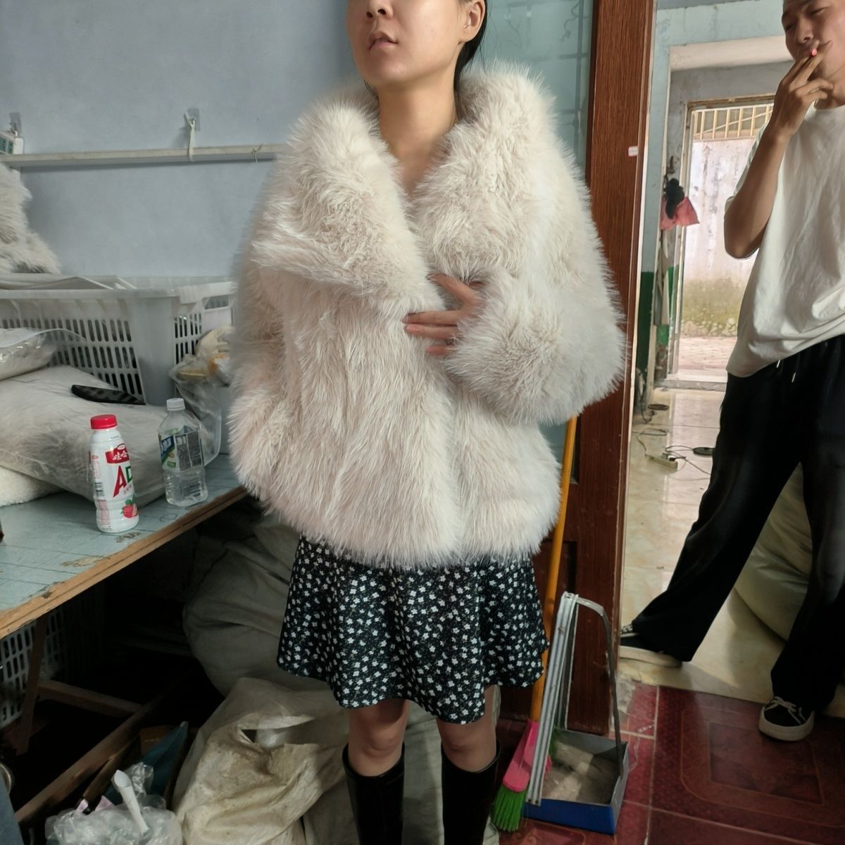 Imitation fox fur jacket with a folded shawl collar and full plush sleeves to the wrist