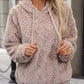 Side profile of the plush jacquard hoodie showing the lined drawstring hood